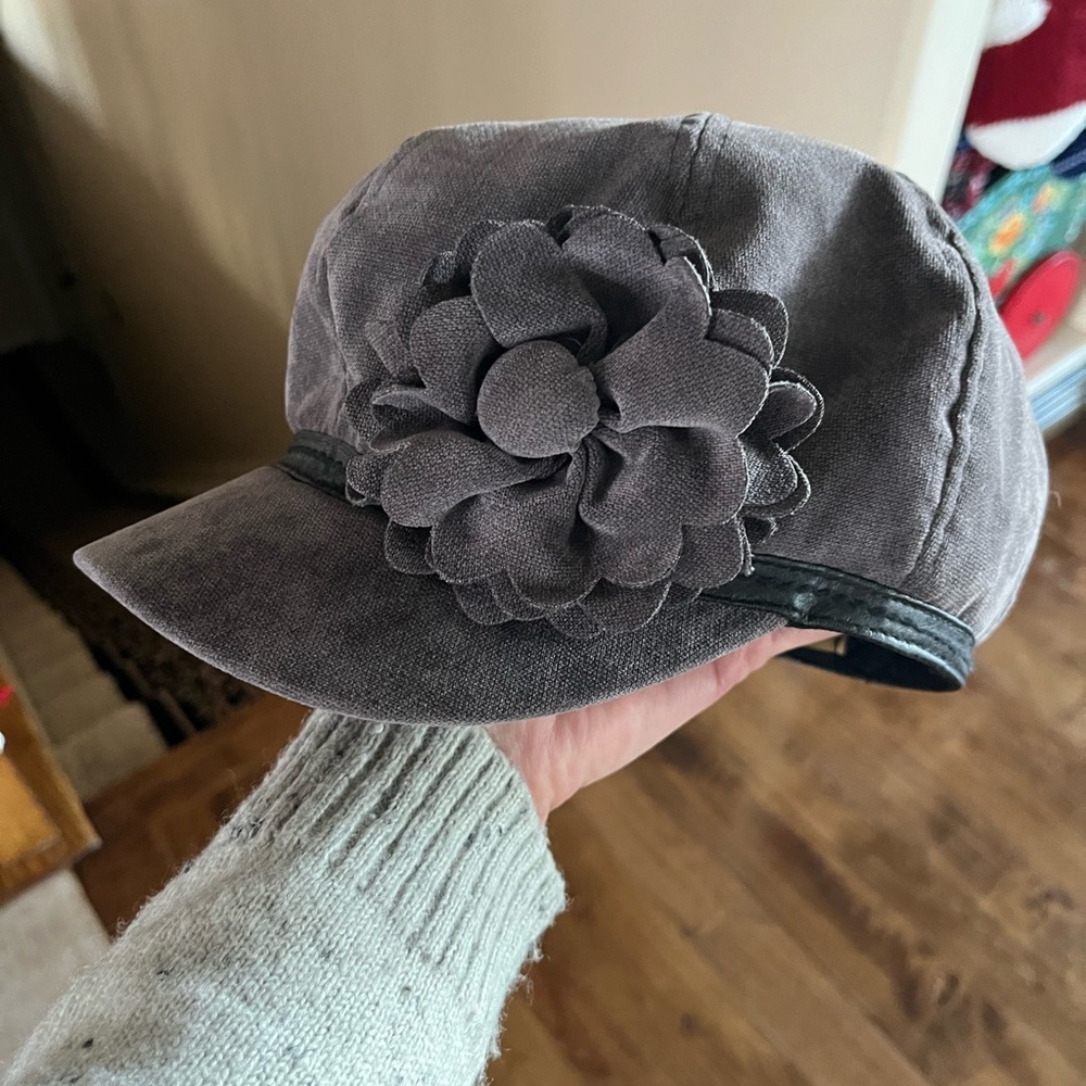 Gray flowered hat with black trim CC exclusives brand